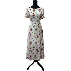 Emily and Fin White Floral Midi Dress with Pockets and Cape sleeves.